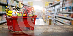 Shopping basket with fresh food. Grocery supermarket, food and eats online buying and delivery concept photo