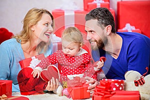 Shopping. Boxing day. Happy family with present box. Love and trust in family. Bearded man and woman with little girl