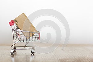 Shopping cart with carboard box