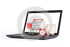 Shopping cart, clock and piggy bank on laptop