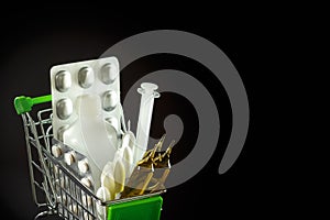 Shopping cart with drugs. Pharmacology and drug purchase concept