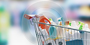 Shopping cart filled with detergents photo