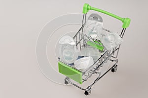 shopping cart shopping cart filled with various containers and packages with modern soft contact lenses photo