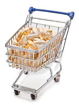 Shopping cart filled with vitamin tablets