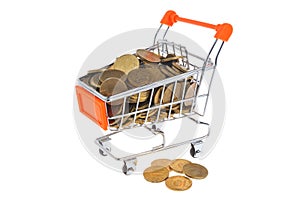 Shopping cart full of coins isolated on white