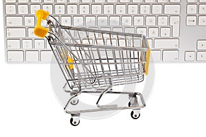 A shopping cart and keyboard
