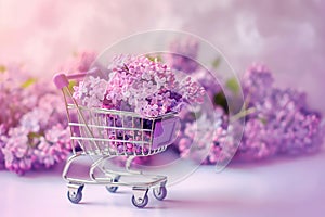 Shopping cart with lilac blooming branches. Spring shopping, sale, discounts. Florist advertisement, copy space for text. Spring