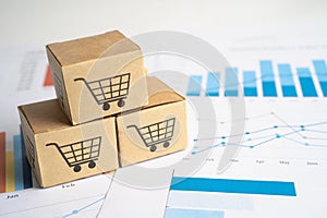 Shopping cart logo on box on graph background. Banking Account, Investment Analytic research data economy, trading, Business