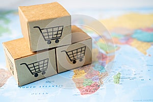 Shopping cart logo on box on world globe map background. Banking Account, Investment Analytic research data economy, trading,