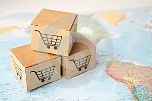 Shopping cart logo on box on world globe map background. Banking Account, Investment Analytic research data economy, trading,