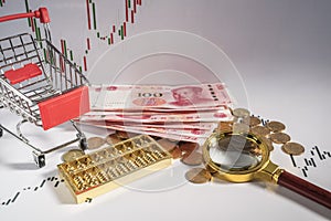 Shopping cart, magnifying glass, RMB, Economy, Curves, coins, cash photo