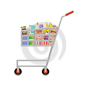 Shopping cart with products. Supermarket