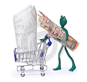 Shopping cart with receipts and frog with 50 euro bills photo