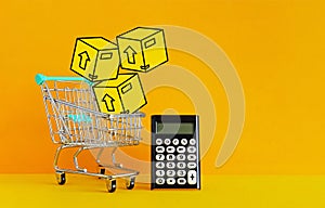 Shopping cart supermarket with boxes and calculator. The concept commerce, online shopping. E-commerce sales