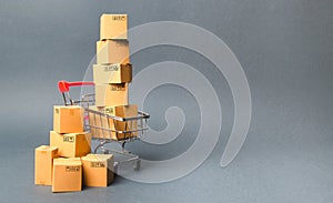 Shopping cart supermarket with boxes. Sales of products. The concept commerce, online shopping. E-commerce, sales and sale