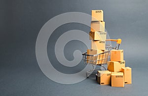 Shopping cart supermarket with boxes. Sales of products. The concept commerce, online shopping. Purchasing power, delivery order