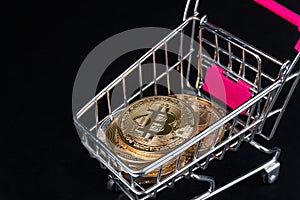 Shopping cart with Symbol Cryptocurrency, bitcoin