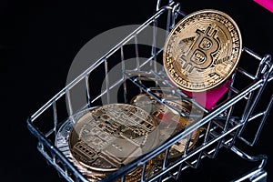 Shopping cart with Symbol Cryptocurrency, bitcoin
