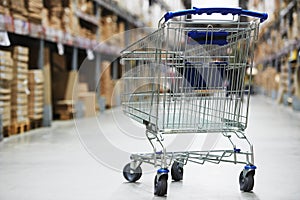 Shopping cart trolley in warehouse