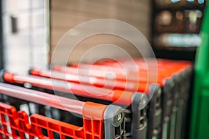 Shopping carts in supermarket closeup, nobody