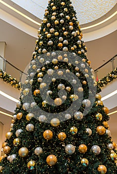 Shopping center- tall Christmas tree decorated baubles