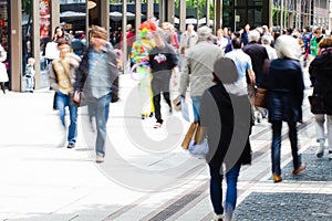 Shopping city people in motion blur photo