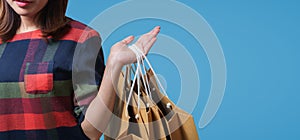 Shopping close up asian woman holding bags, isolated on white background, Copy space with clipping path