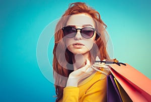 Shopping Concept - Close up Portrait young beautiful attractive redhair girl smiling looking at camera with shopping bag