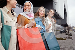 Shopping. Diversity Girls Holding Bags. Group Of Smiling Multicultural Women Standing Near Mall.