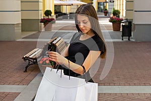 Shopping girl looking in bag sale lifestyles happiness