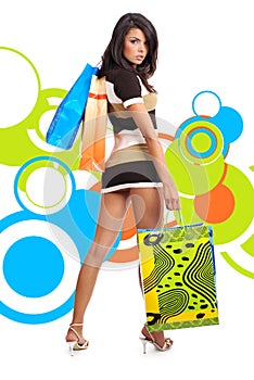 Shopping girl over abstract background