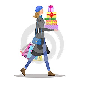 Shopping girl. Woman with colourful gift boxes and shopping bags