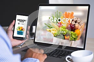 Shopping groceries on online supermarket for food grocery shop photo