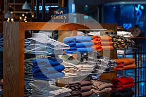 Shopping mall new season, display of men clothing, elegant fashion