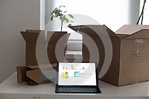 Shopping online e-comerce, Parcel boxes on a laptop.