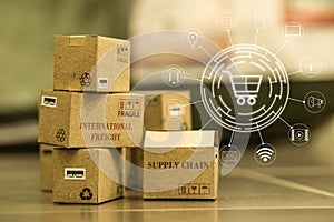 Shopping online, e-commerce concept: cardboard boxes products in warehouse. depicts of International freight or shipping service photo