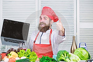 Shopping online. Man chef searching online ingredients cooking food. Grocery shop online. Delivery service. Chef laptop