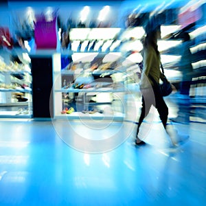 Shopping people at marketplace shoe shop