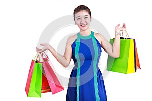 Shopping.Portrait of young happy smiling woman with shopping bags