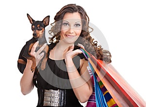 Shopping posh girl with miniature pinscher photo