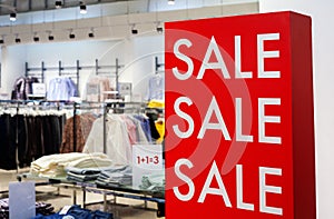 Shopping Sale background. Signage Sale in a clothing store.