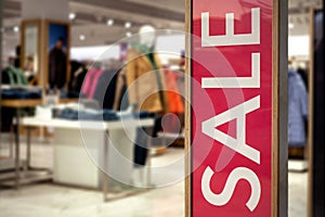 Shopping Sale background. Signage Sale in a clothing store.