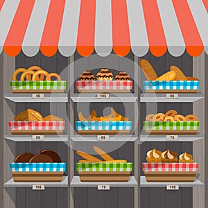 Shopping stands with bakery products in baskets. Supermarket shelves with wheat, rye and whole grain bread. Pretzel and