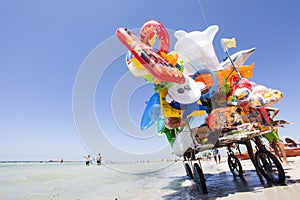 Shopping street vendor beach sea shore full of games and fun