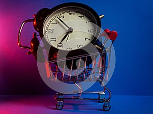Shopping Time Concept - Cart and Clock or Hourglass. Creative lighting