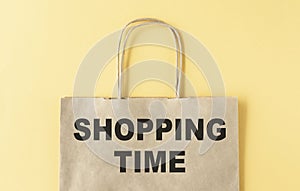 Shopping time word on paper bag isolated