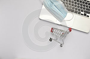 shopping trolley with face mask.