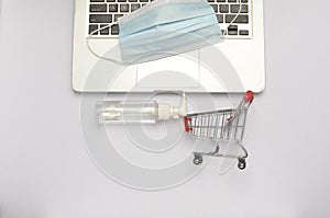 Shopping trolley with face mask.