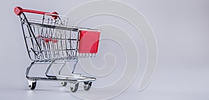 Shopping trolley. Shopping cart. Shopping trolley on muti collored background. photo