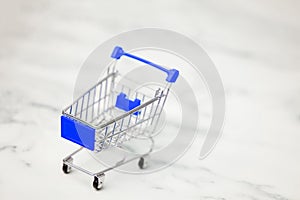 Shopping trolleys on light background